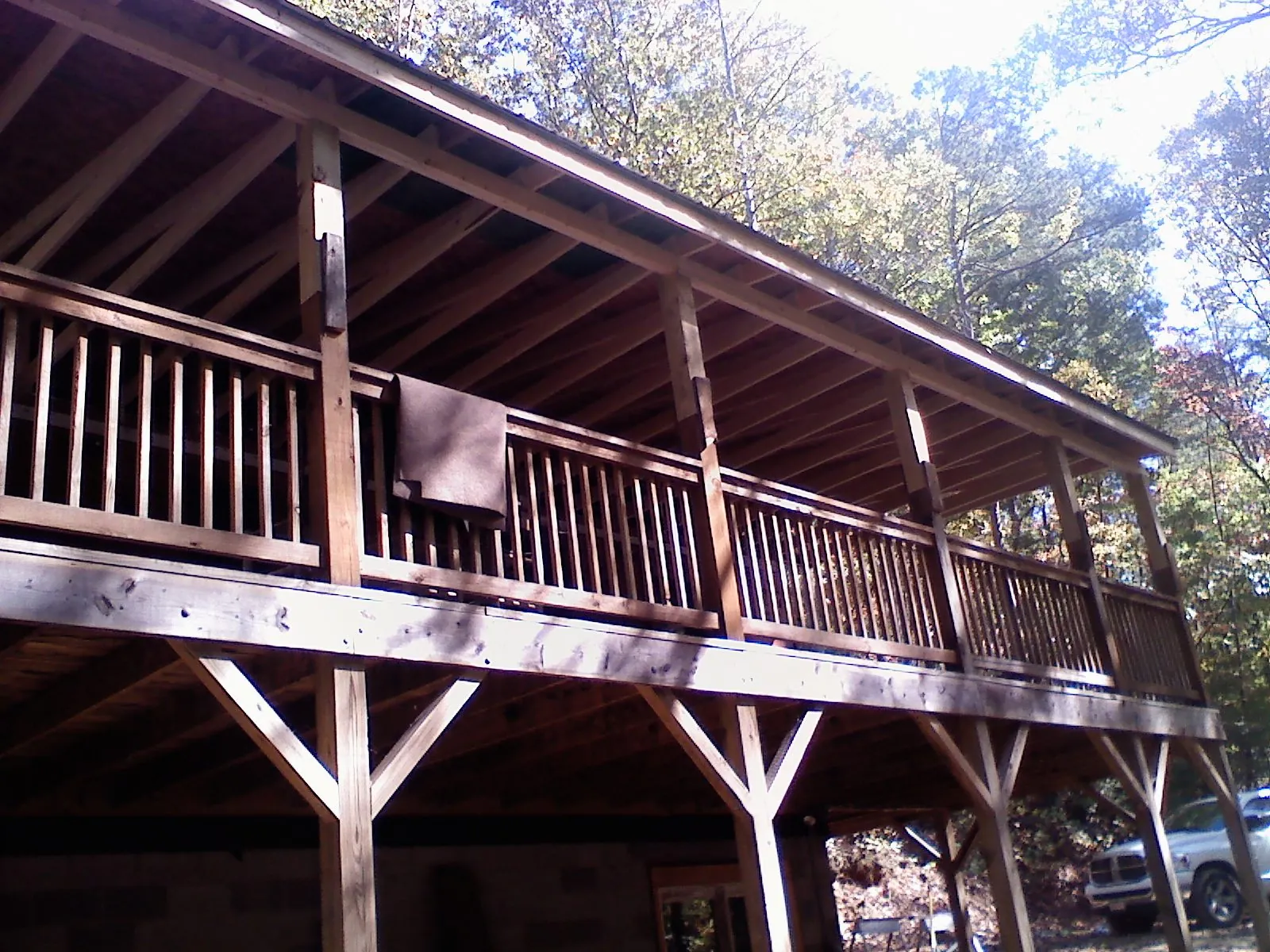Timber framing under a new elevated porch and deck — Roof Leak Repair in Hampden by Roofing Brothers